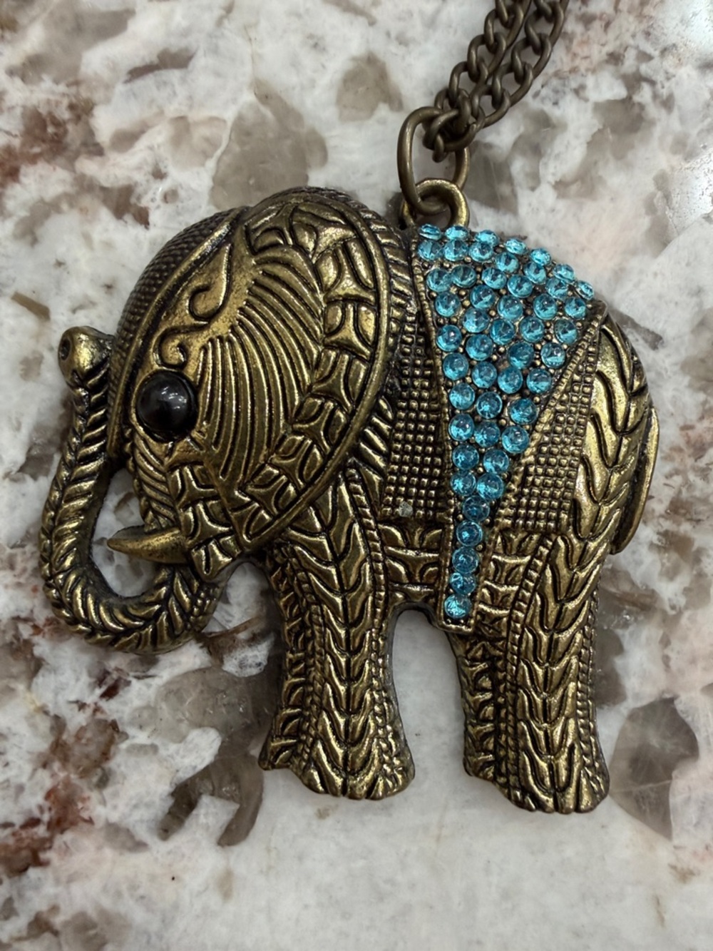 Antique Brass Tone Elephant Pendant with Blue Rhinestones